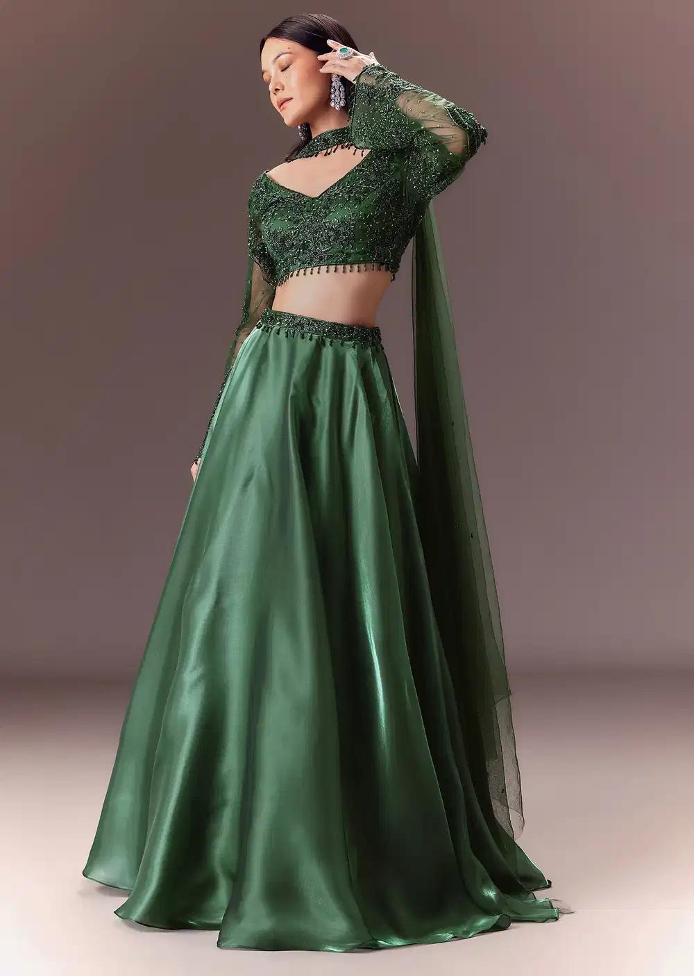 Bottle Green Organza Lehenga Skirt Ensemble Featuring Hand Work