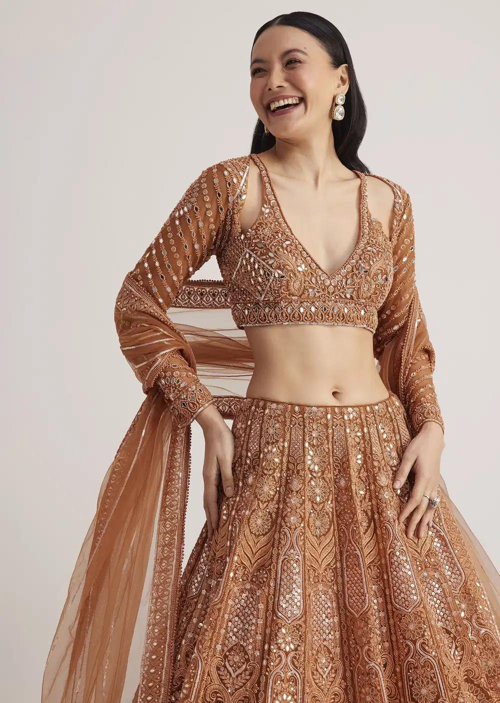 Brown Embellished Lehenga Skirt Ensemble Featuring Detailed Embroidery