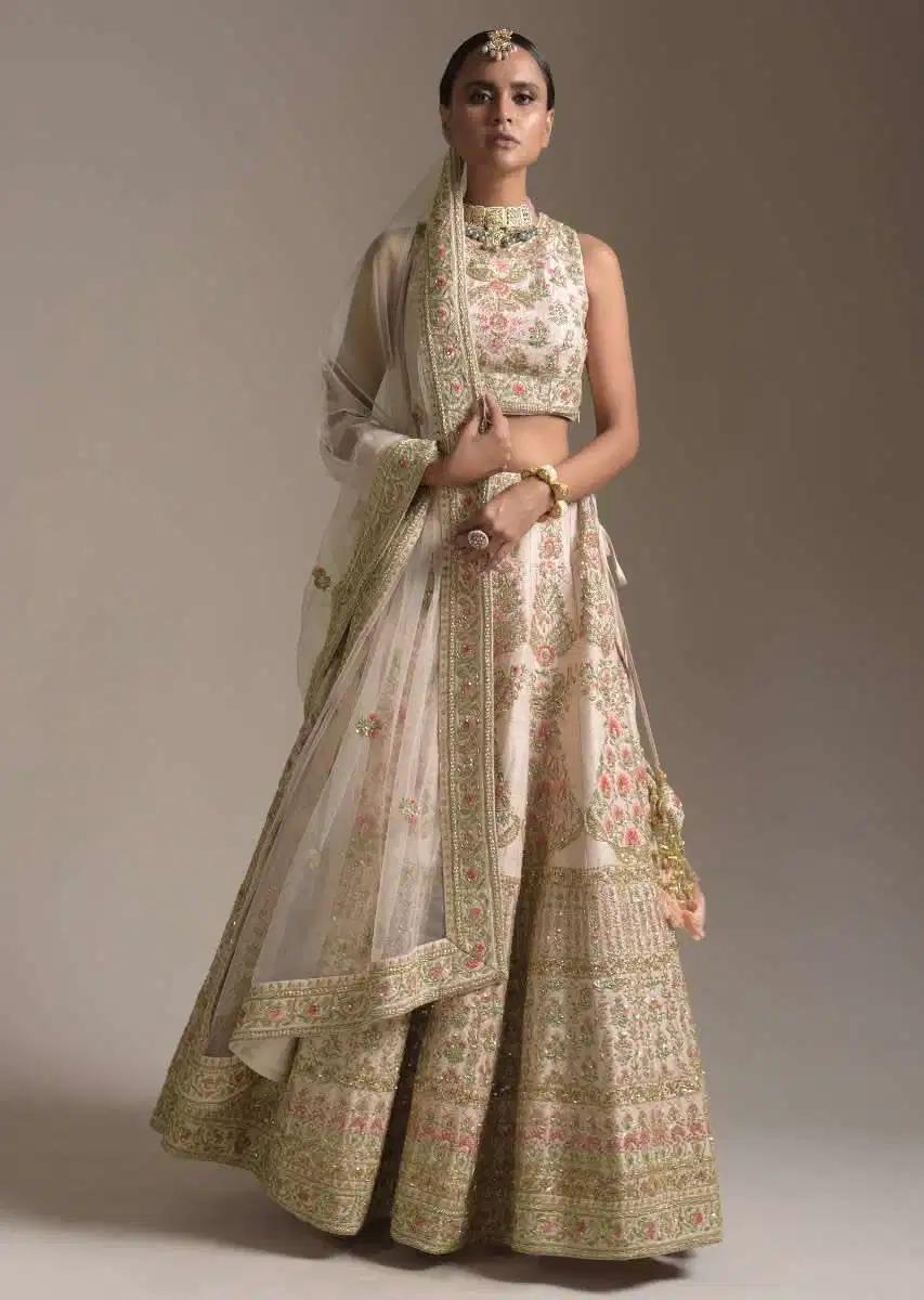 Creamy Pink Lehenga Skirt Blouse In Raw Silk Featuring Pink Resham Zardosi Handcrafted Floral Kalis Online Kalki Fashion