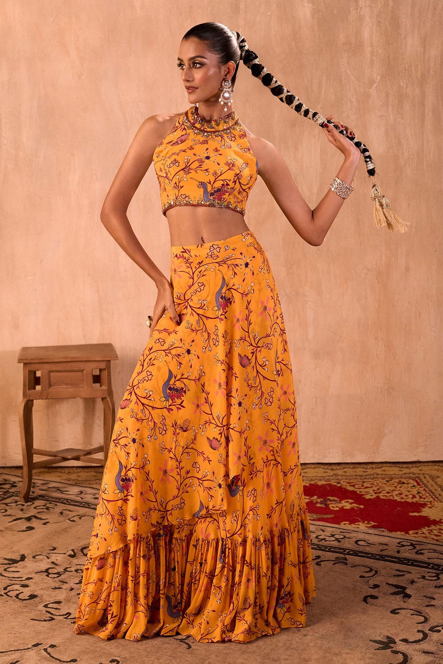 Yellow Crepe Tassels Halter Neck Floral Print Blouse And Layered Lehenga Set - Designer Kurta Set