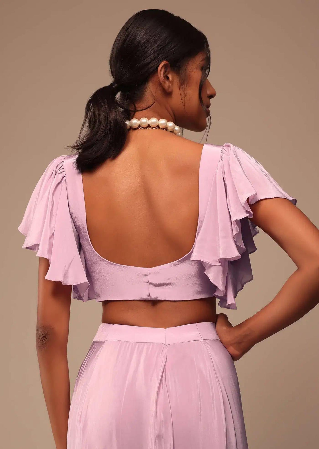 Baby Pink Crepe Saree With Bow Blouse And Waist Belt