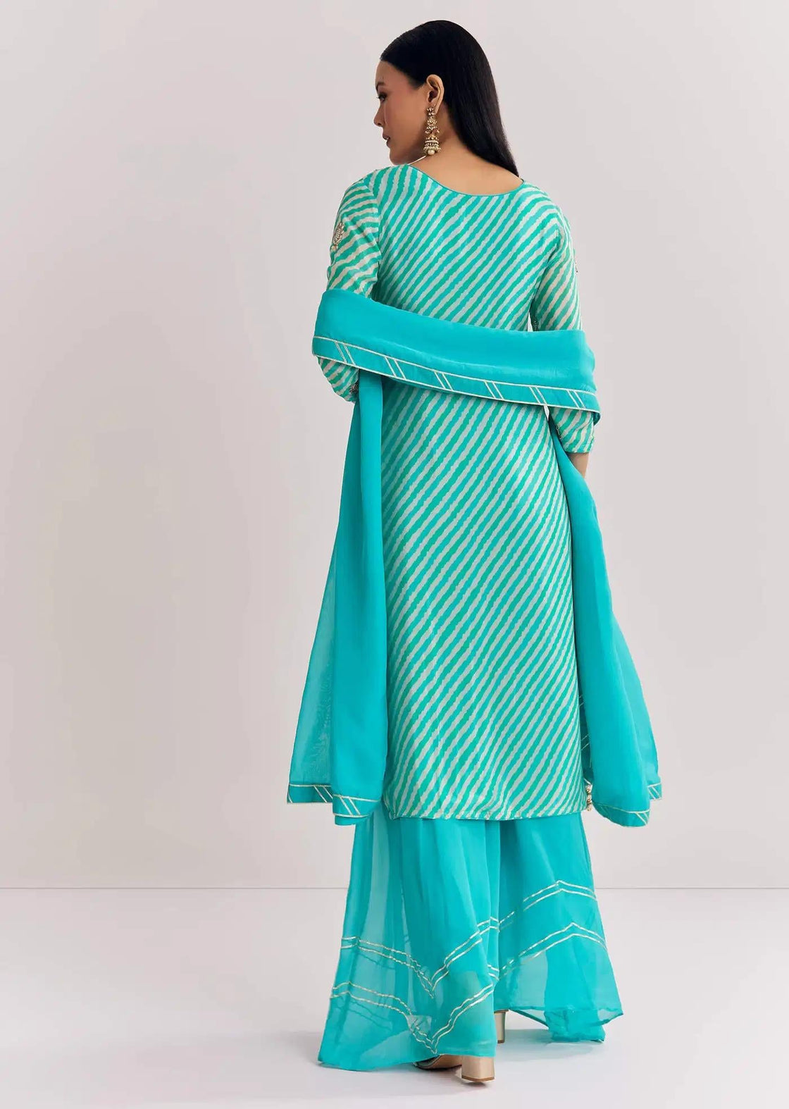 Baby Pink Georgette Tunic Palazzo Trousers Outfit Featuring Organza Drape Moti Detailing