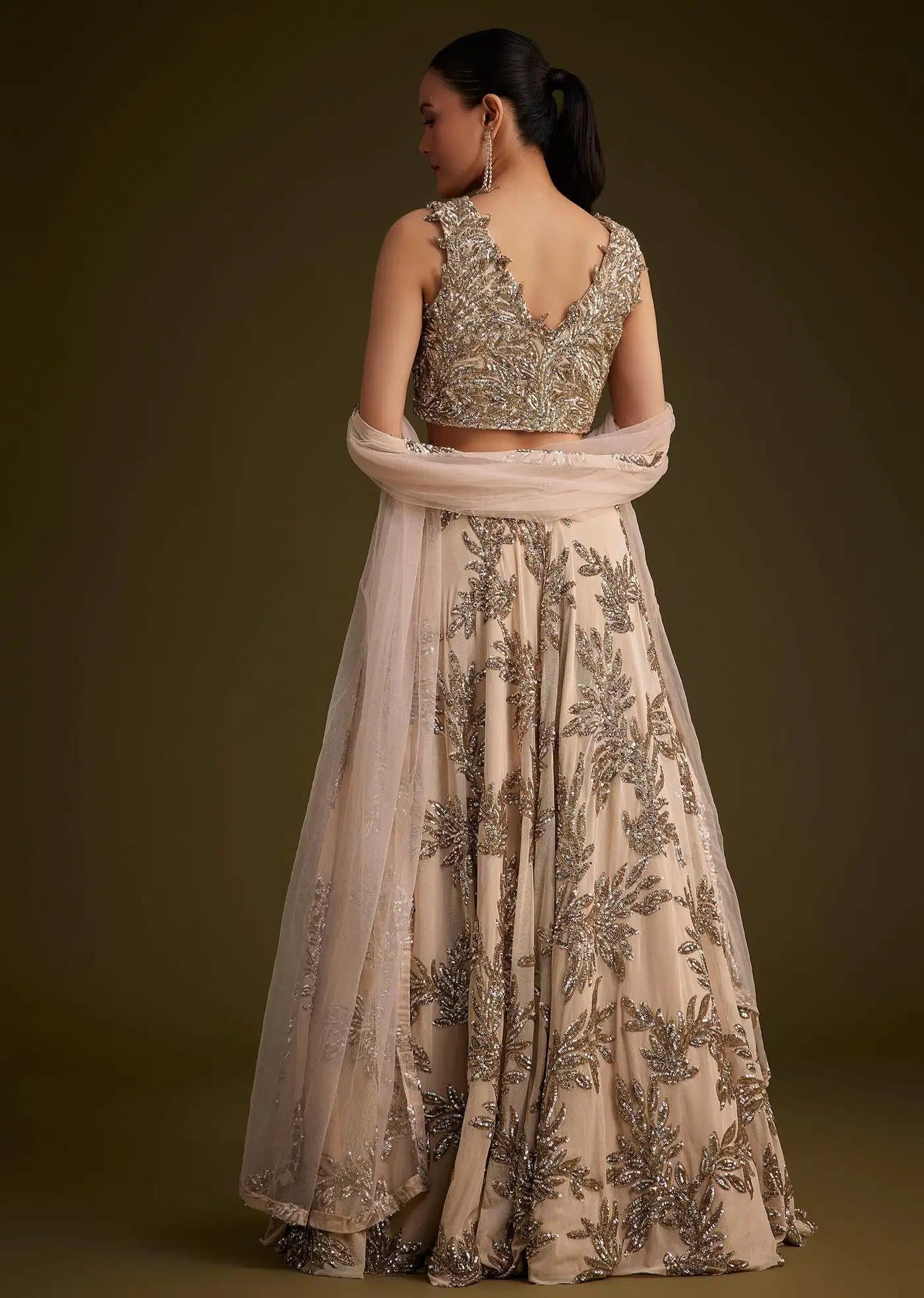 Beige Net Lehenga Skirt Ensemble Featuring Sequins Drape