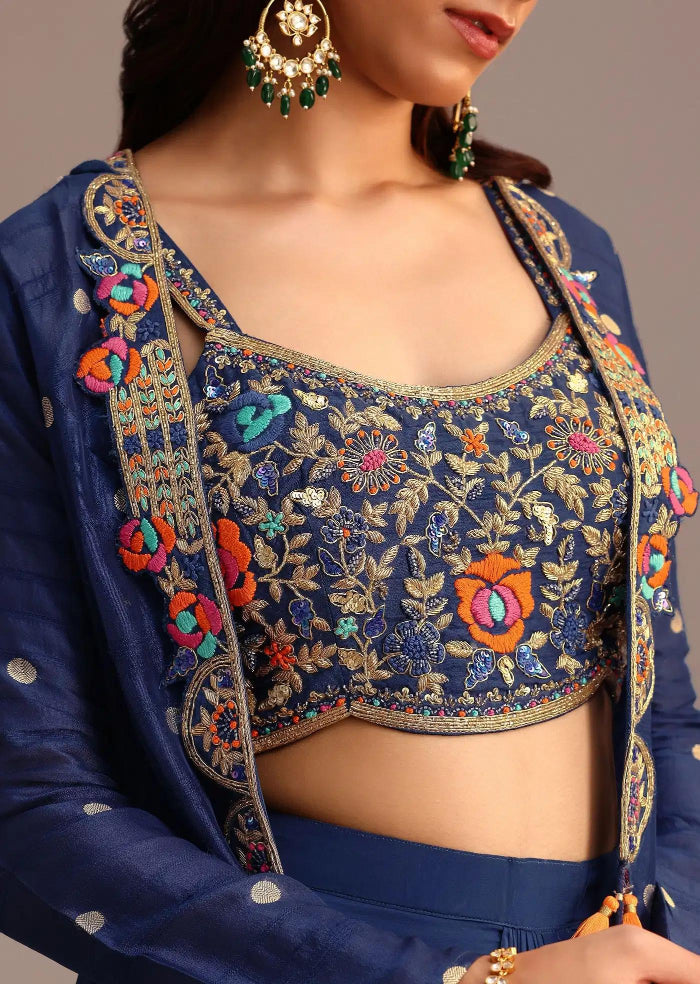 Navy blue embroidered blouse with colorful floral patterns on a neutral background