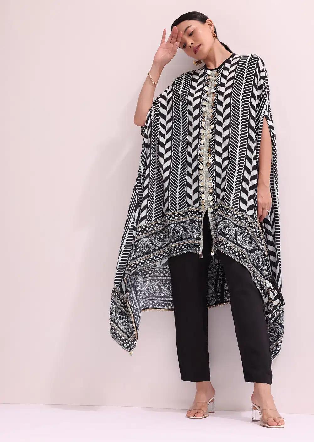 Boho Style Printed Black Kurta Pant Ensemble With Matching Potali Outfit