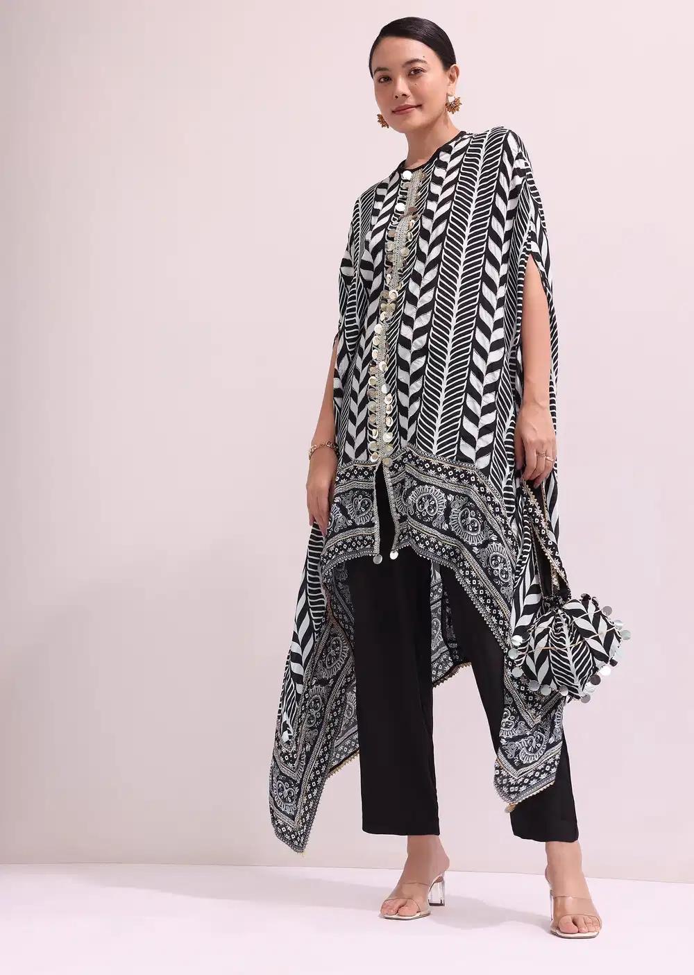Boho Style Printed Black Kurta Pant Ensemble With Matching Potali Outfit