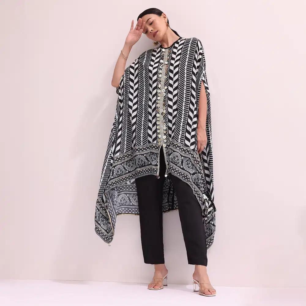 Boho Style Printed Black Kurta Pant Ensemble With Matching Potali Outfit