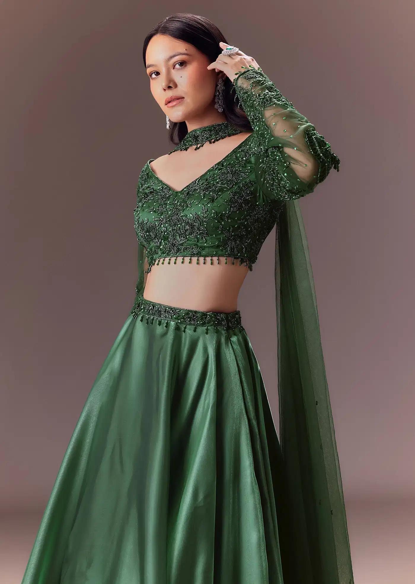 Bottle Green Organza Lehenga Skirt Ensemble Featuring Hand Work