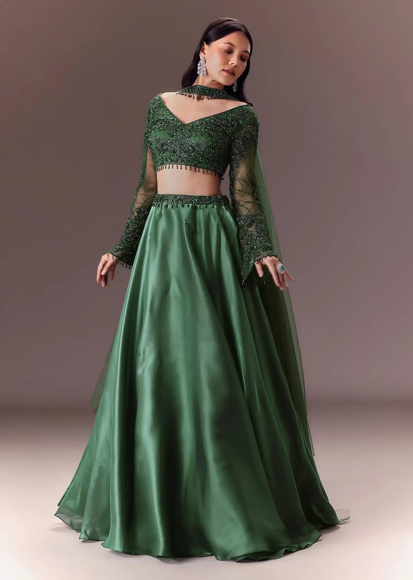 Bottle Green Organza Lehenga Skirt Ensemble Featuring Hand Work