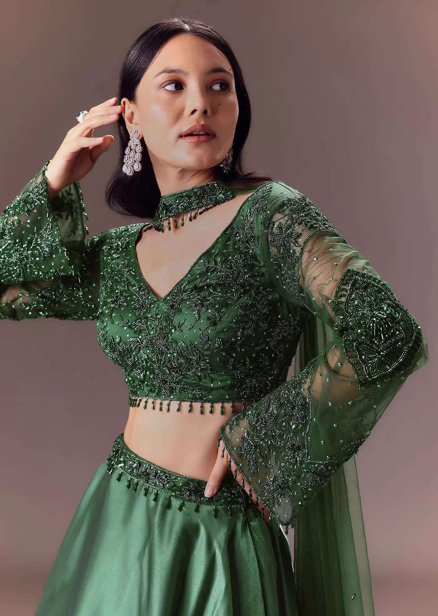 Bottle Green Organza Lehenga Skirt Ensemble Featuring Hand Work