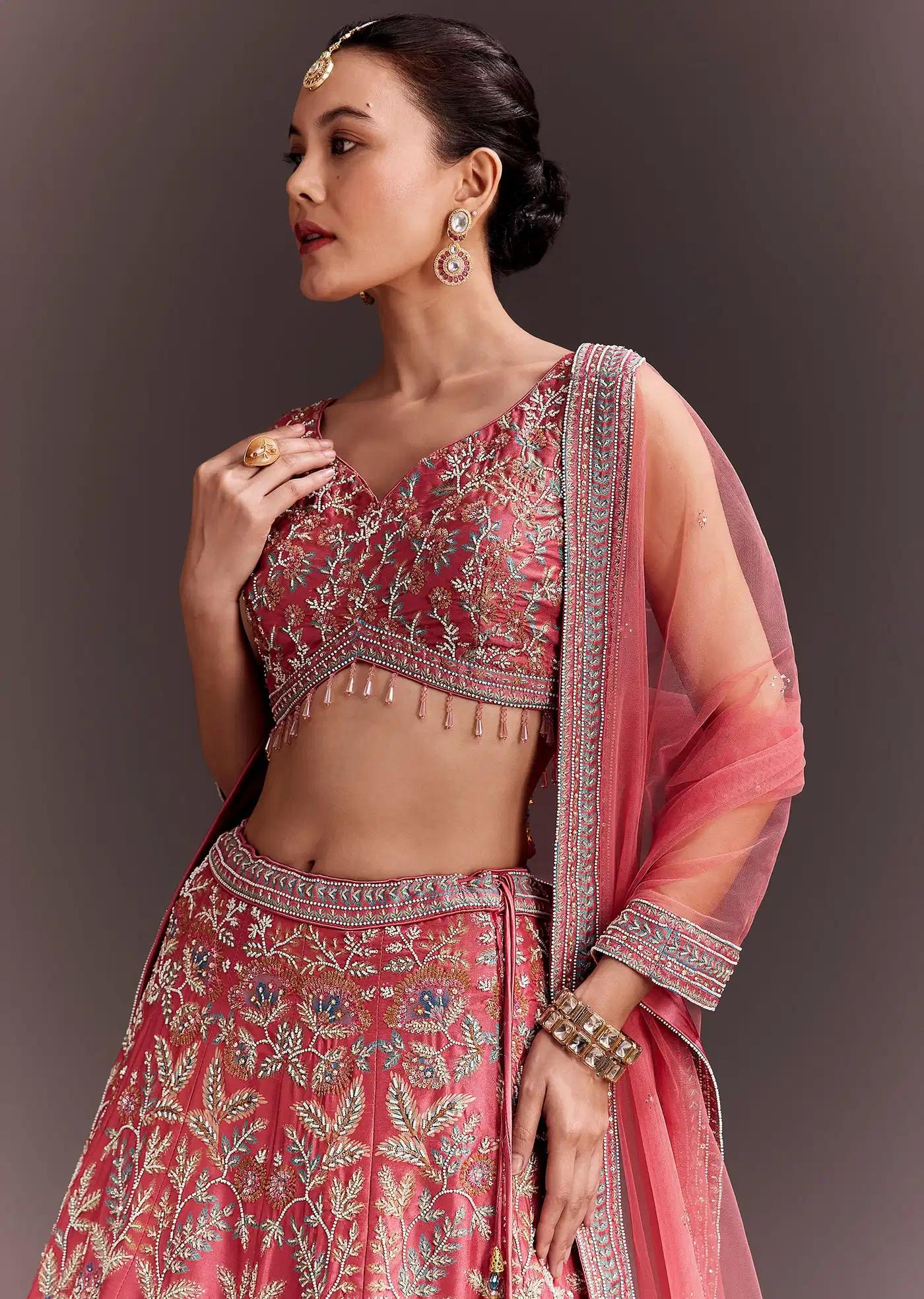 Coral Pink Handcrafted Lehenga Skirt Ensemble Featuring Net Drape