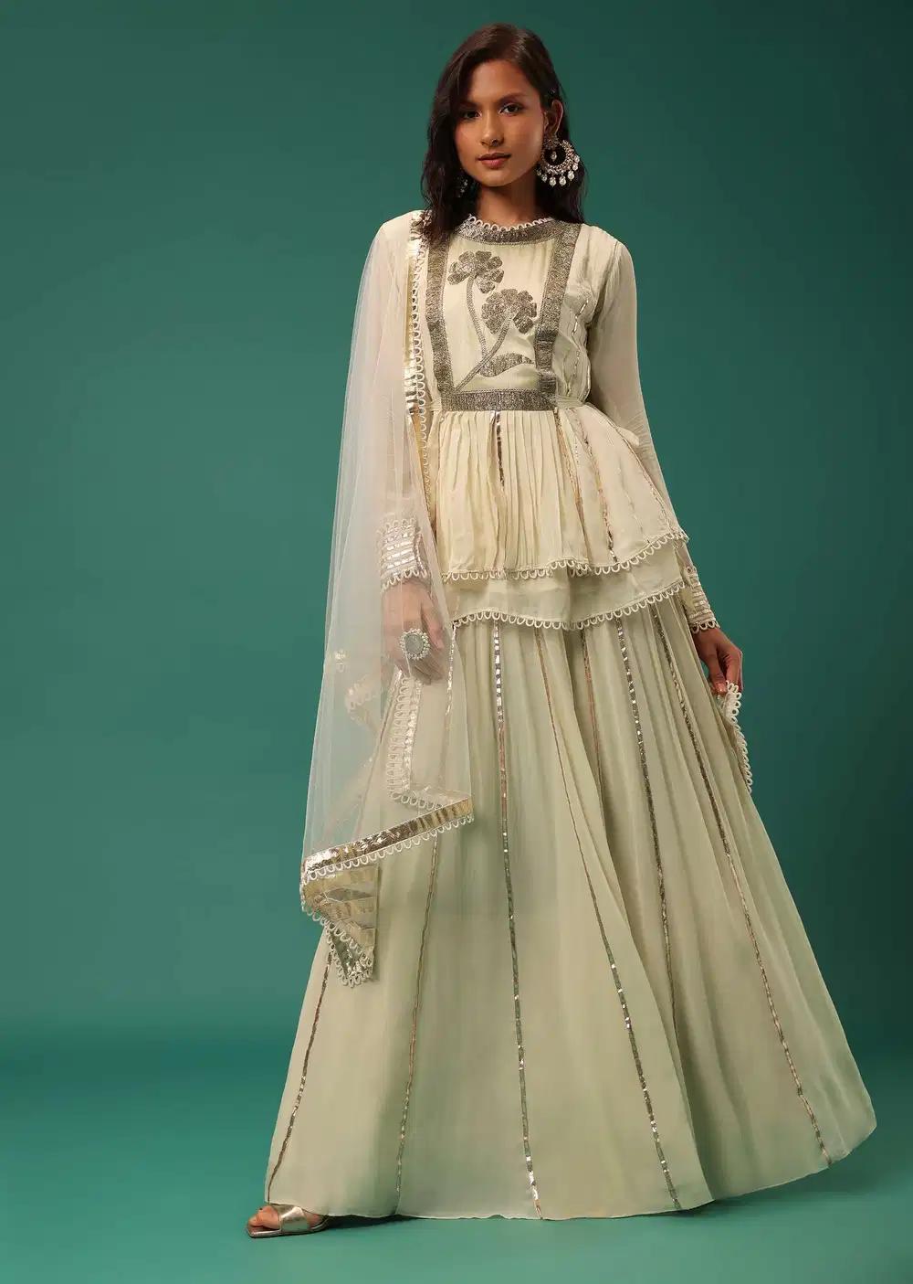Cream White Handcrafted Lehenga Skirt Ensemble Featuring Peplum Top In Georgette