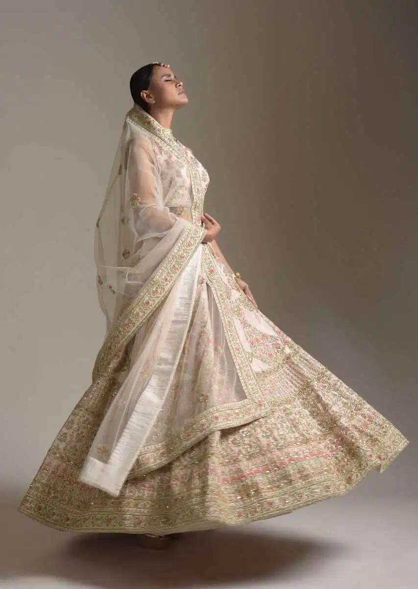 Creamy Pink Lehenga Skirt Blouse In Raw Silk Featuring Pink Resham Zardosi Handcrafted Floral Kalis Online Kalki Fashion