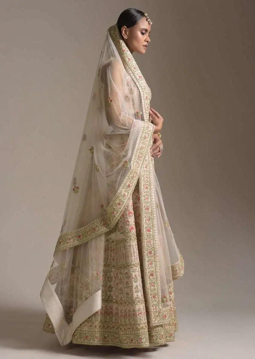 Creamy Pink Lehenga Skirt Blouse In Raw Silk Featuring Pink Resham Zardosi Handcrafted Floral Kalis Online Kalki Fashion