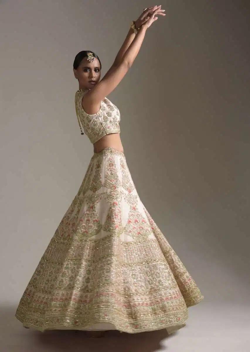 Creamy Pink Lehenga Skirt Blouse In Raw Silk Featuring Pink Resham Zardosi Handcrafted Floral Kalis Online Kalki Fashion