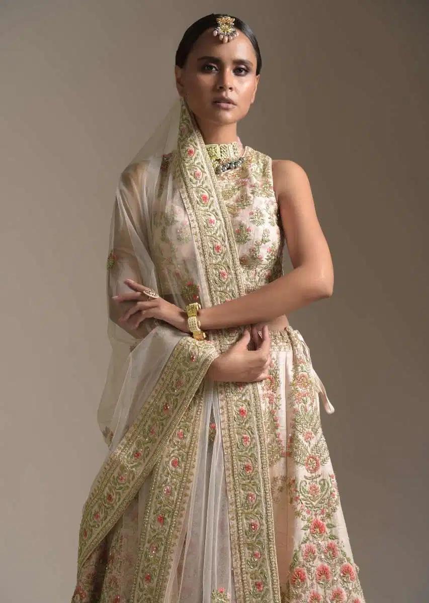 Creamy Pink Lehenga Skirt Blouse In Raw Silk Featuring Pink Resham Zardosi Handcrafted Floral Kalis Online Kalki Fashion
