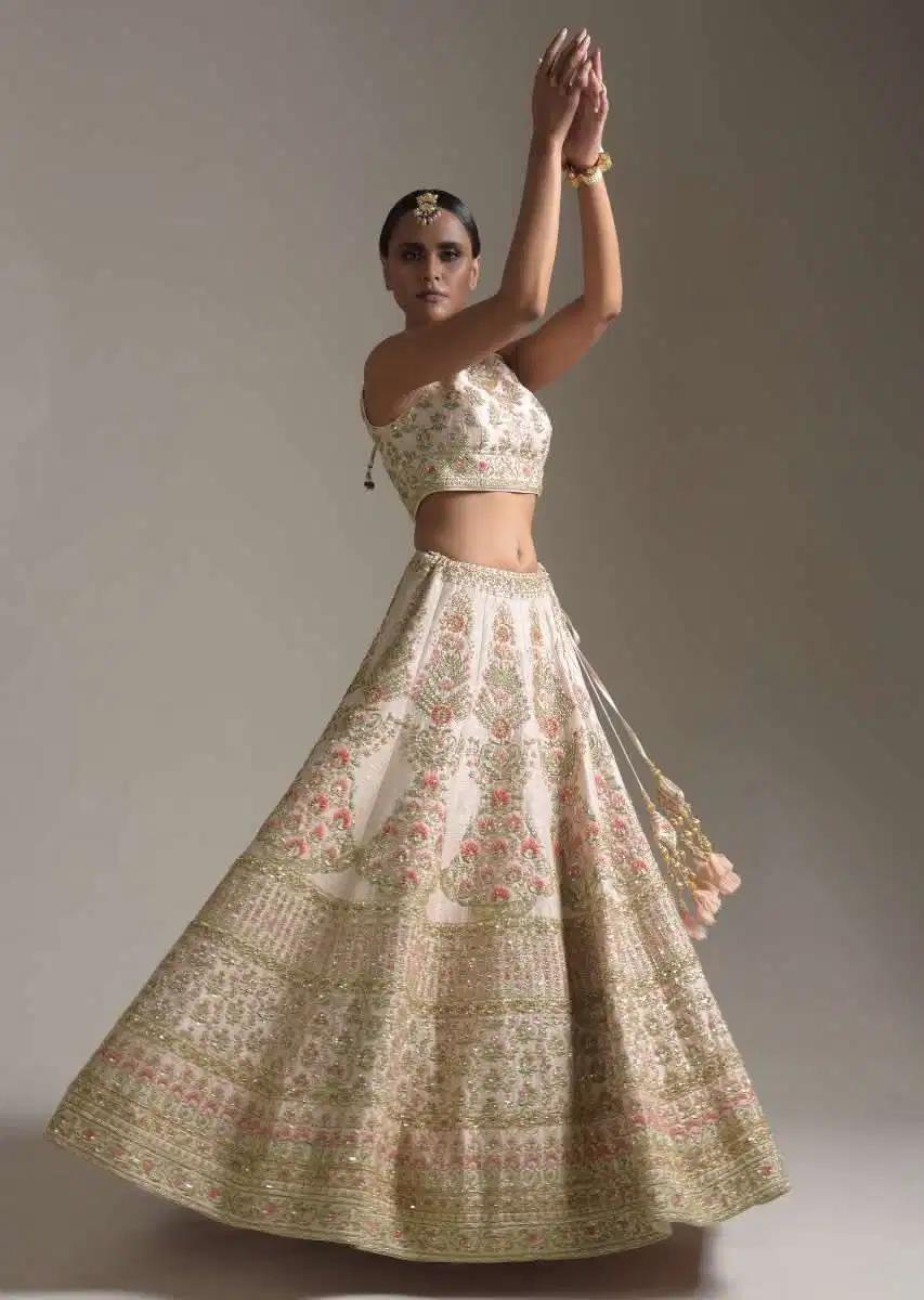 Creamy Pink Lehenga Skirt Blouse In Raw Silk Featuring Pink Resham Zardosi Handcrafted Floral Kalis Online Kalki Fashion