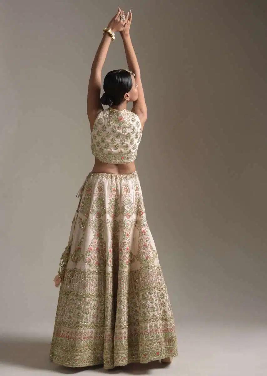 Creamy Pink Lehenga Skirt Blouse In Raw Silk Featuring Pink Resham Zardosi Handcrafted Floral Kalis Online Kalki Fashion