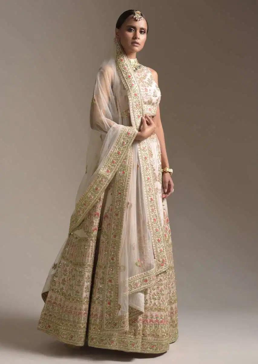 Creamy Pink Lehenga Skirt Blouse In Raw Silk Featuring Pink Resham Zardosi Handcrafted Floral Kalis Online Kalki Fashion