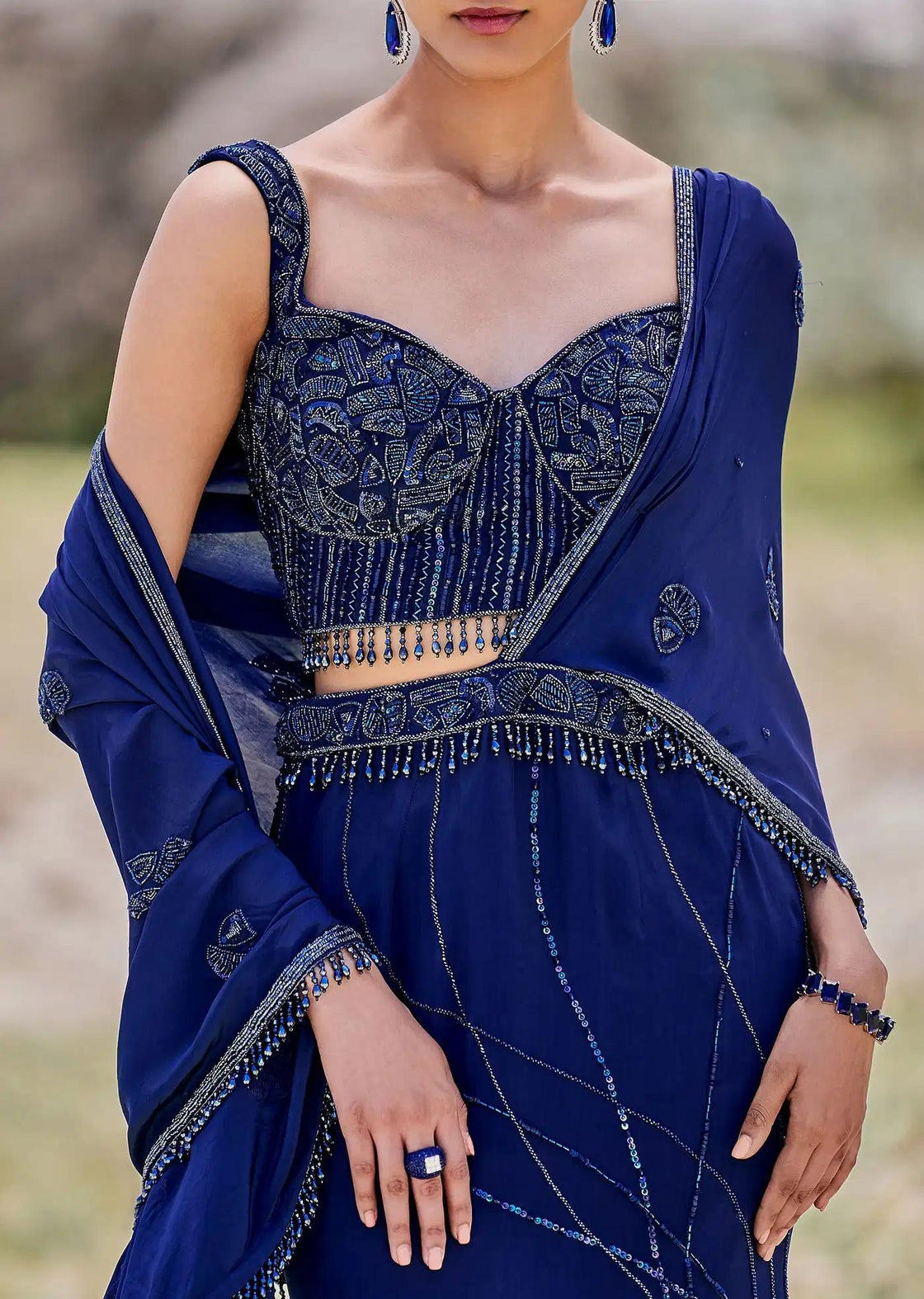 Fishcut Asymmetric Crepe Skirt In Blue With Embroidered Blouse