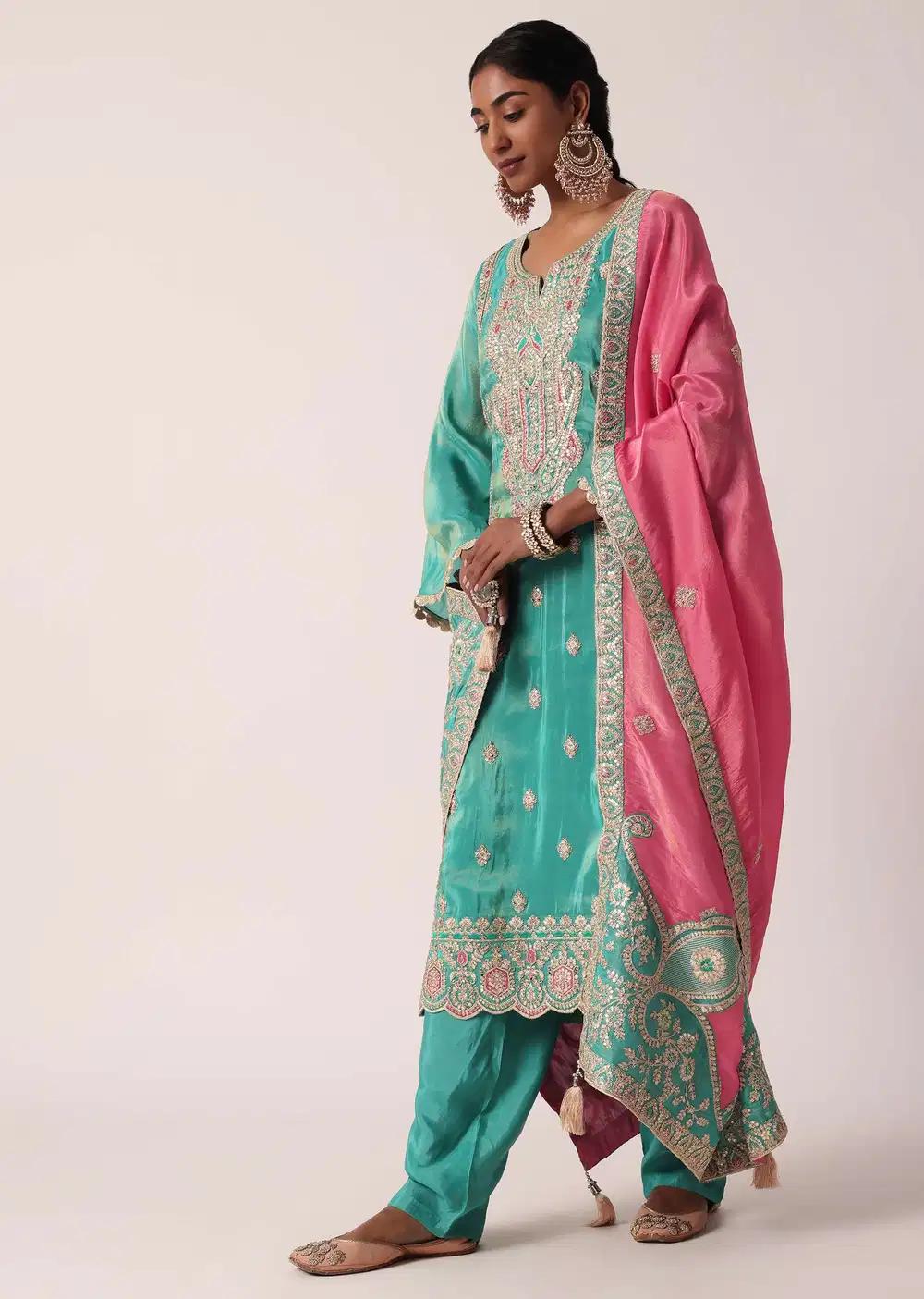 Green Silk Pant Ensemble With Zari Embroidered Kurta Outfit