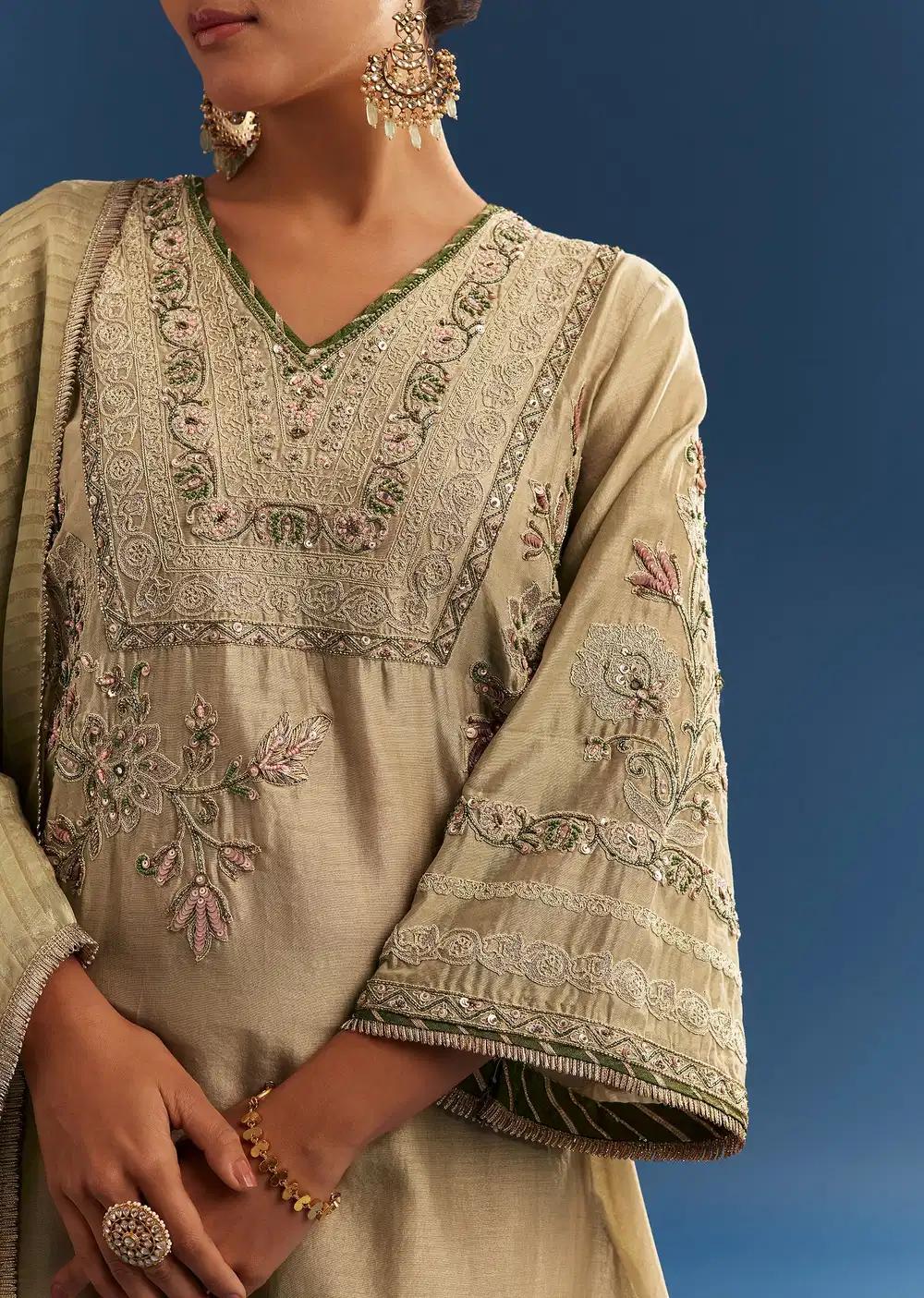 Light Green Chanderi Kurta Ensemble With Organza Dupatta And Tassel Tie Up Back Outfit