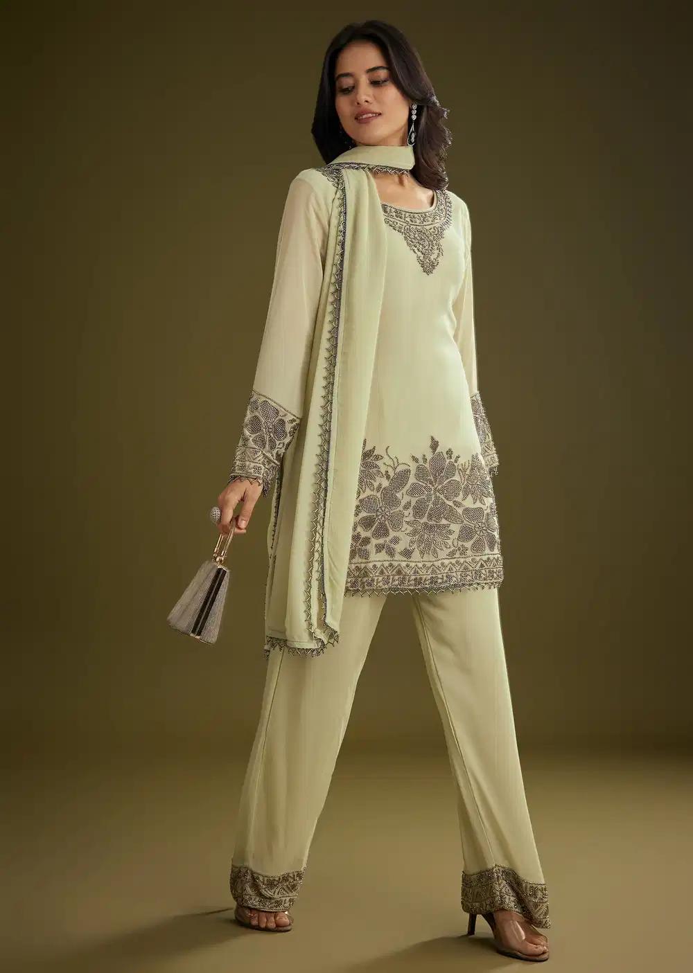 Mint Green Georgette Beads Kurta Ensemble With Tassels Bordered Dupatta Outfit