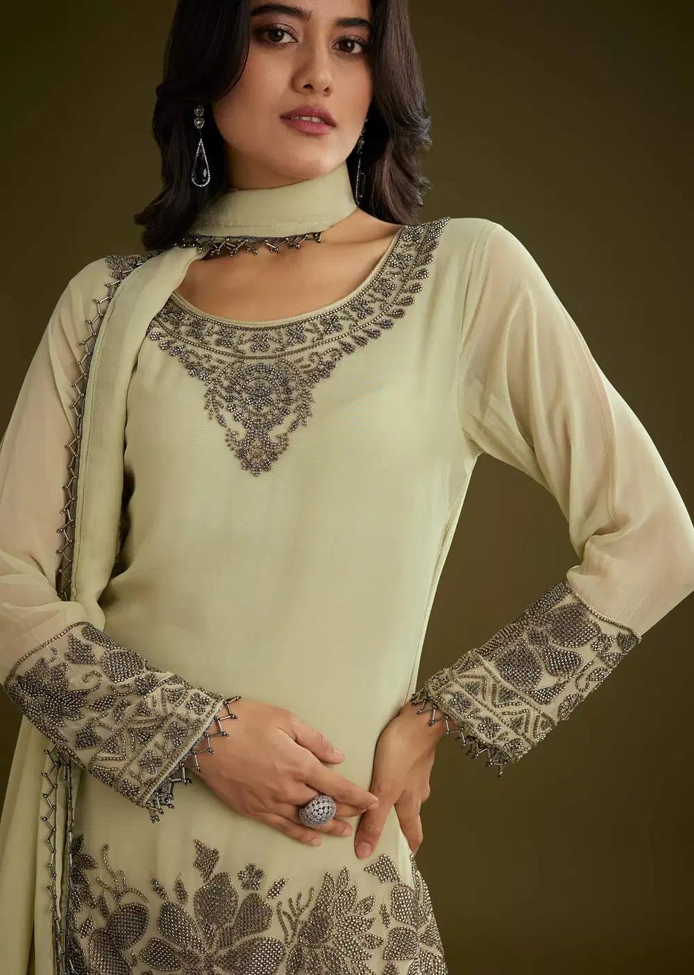 Mint Green Georgette Beads Kurta Ensemble With Tassels Bordered Dupatta Outfit