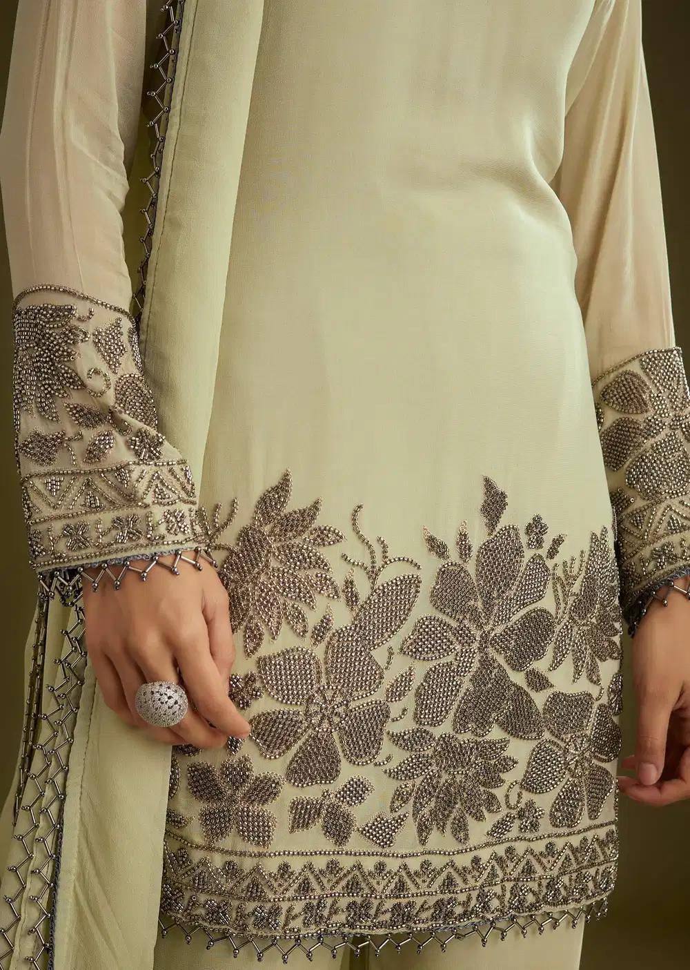 Mint Green Georgette Beads Kurta Ensemble With Tassels Bordered Dupatta Outfit