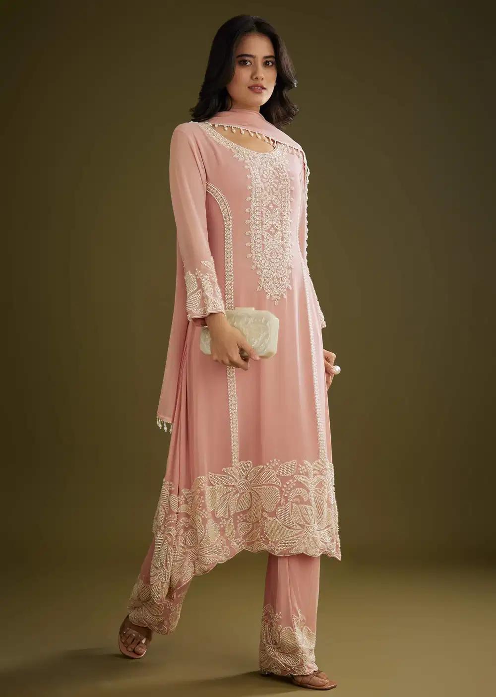 Pink Georgette Moti Work Asymmetrical Kurta Ensemble With Tassels Bordered Dupatta Outfit