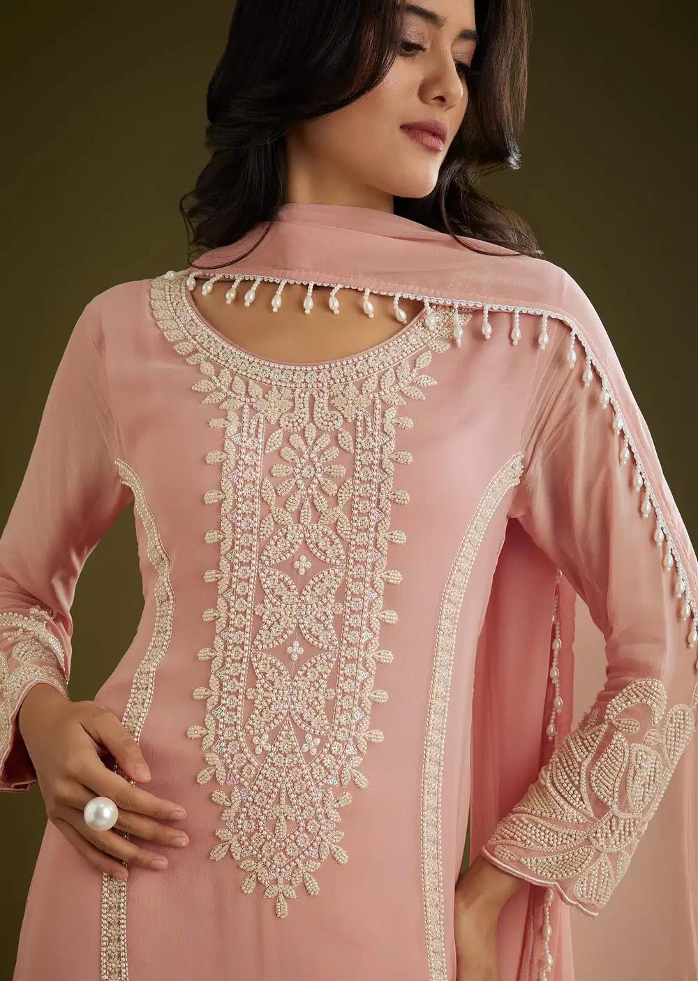 Pink Georgette Moti Work Asymmetrical Kurta Ensemble With Tassels Bordered Dupatta Outfit