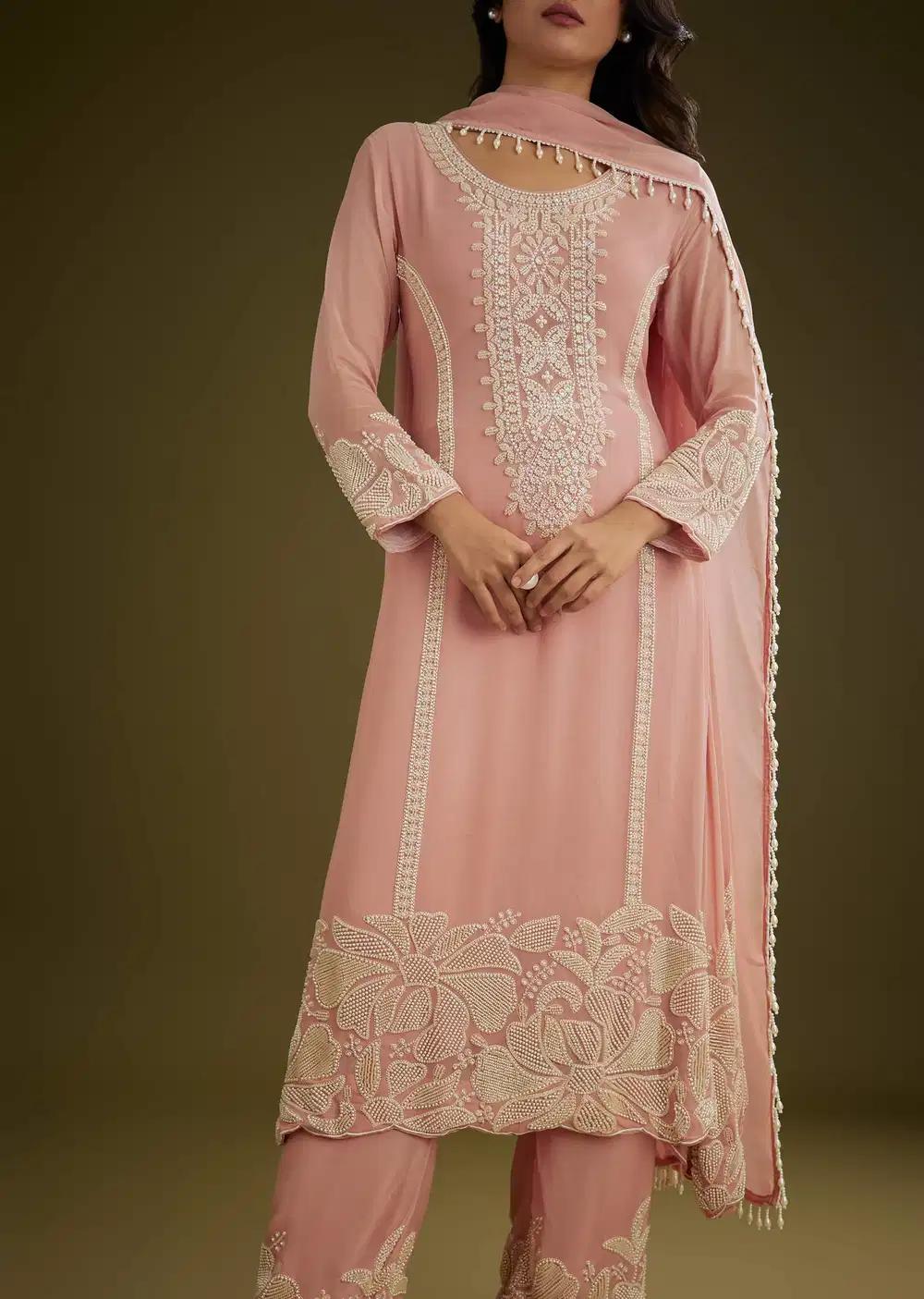 Pink Georgette Moti Work Asymmetrical Kurta Ensemble With Tassels Bordered Dupatta Outfit