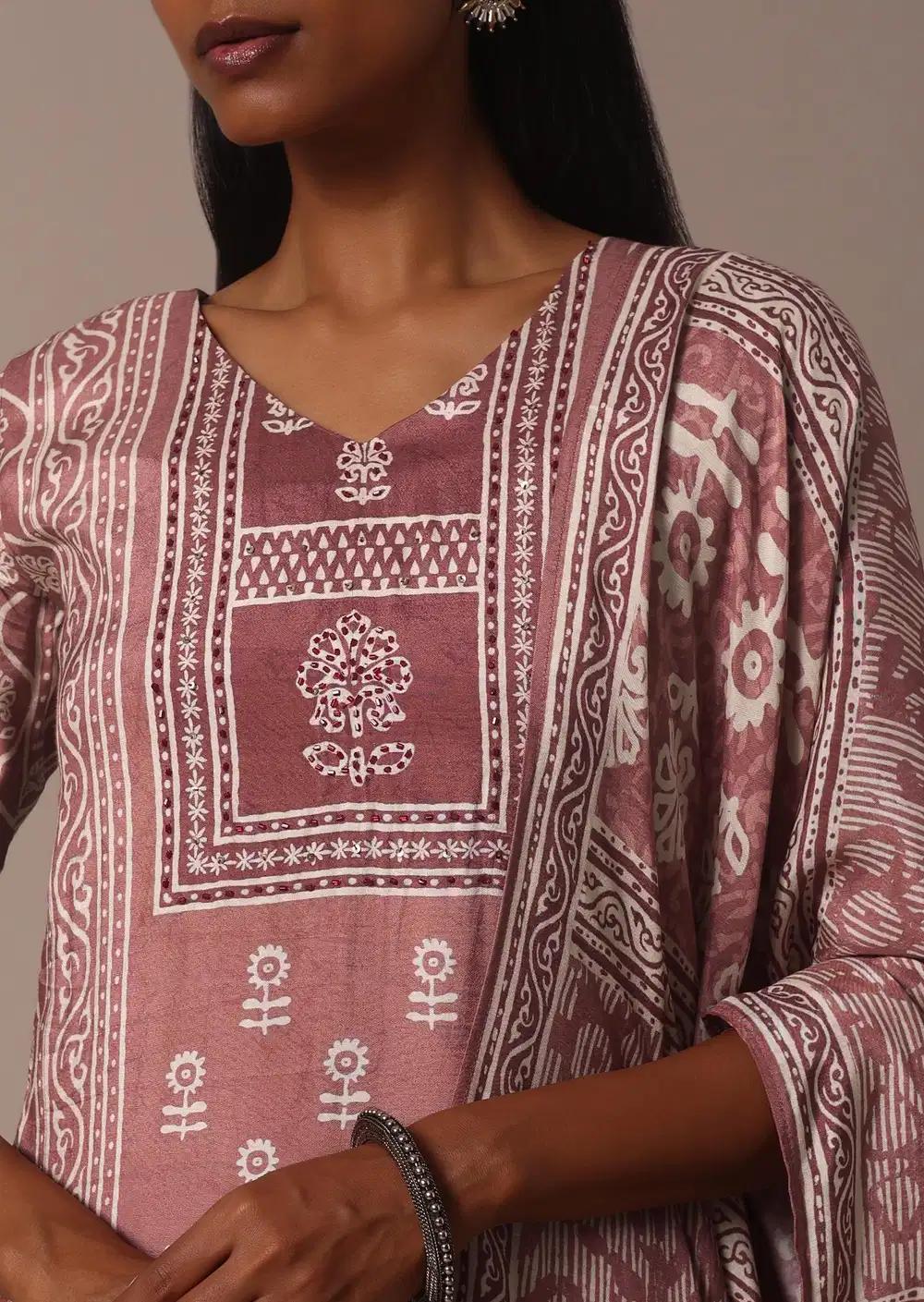Pink Printed Kurti Pant Ensemble With Embroidered Detail