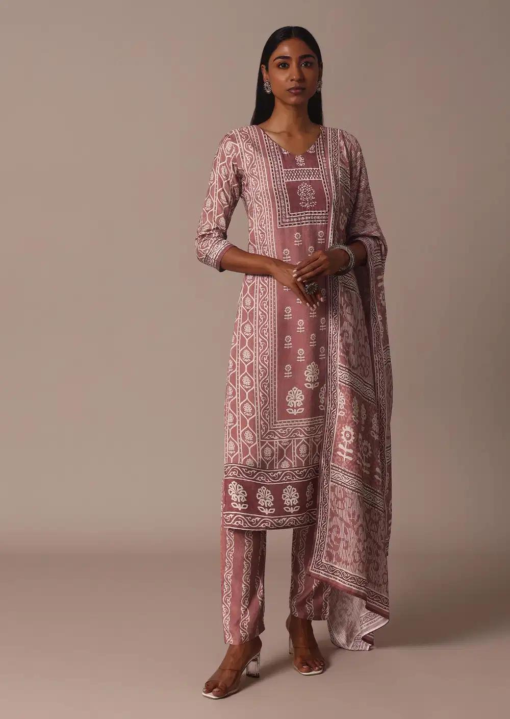 Pink Printed Kurti Pant Ensemble With Embroidered Detail