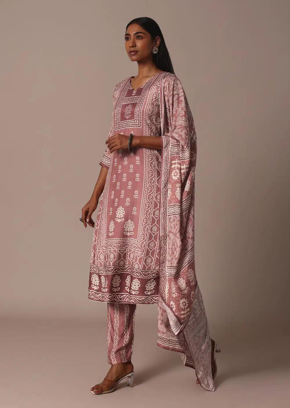 Pink Printed Kurti Pant Ensemble With Embroidered Detail