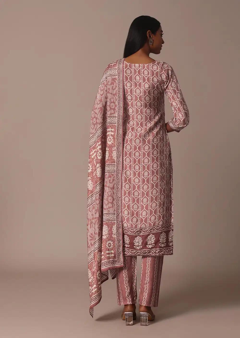 Pink Printed Kurti Pant Ensemble With Embroidered Detail