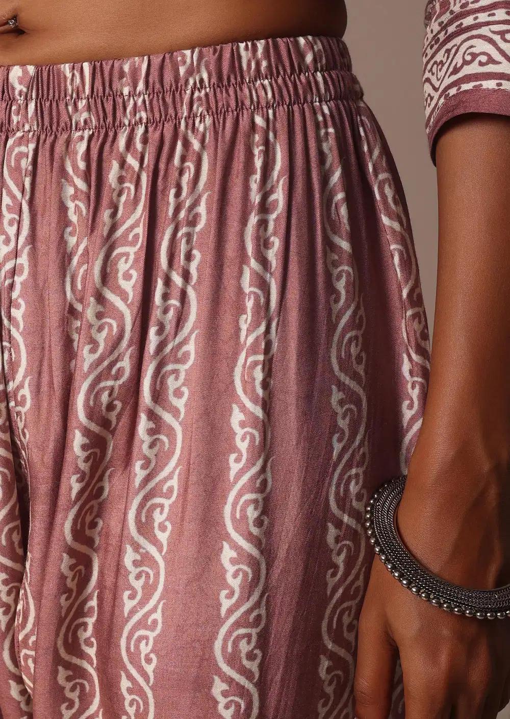 Pink Printed Kurti Pant Ensemble With Embroidered Detail