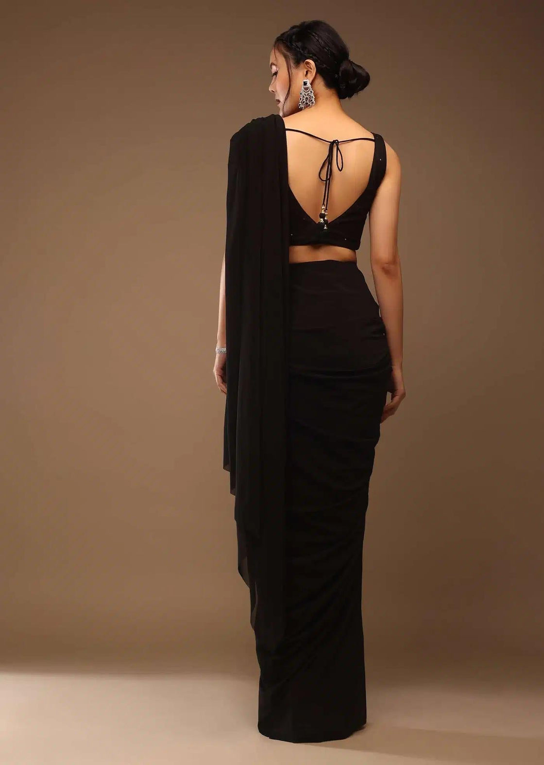Sequin Crop Top With Black Saree Featuring Tassel Dori Back