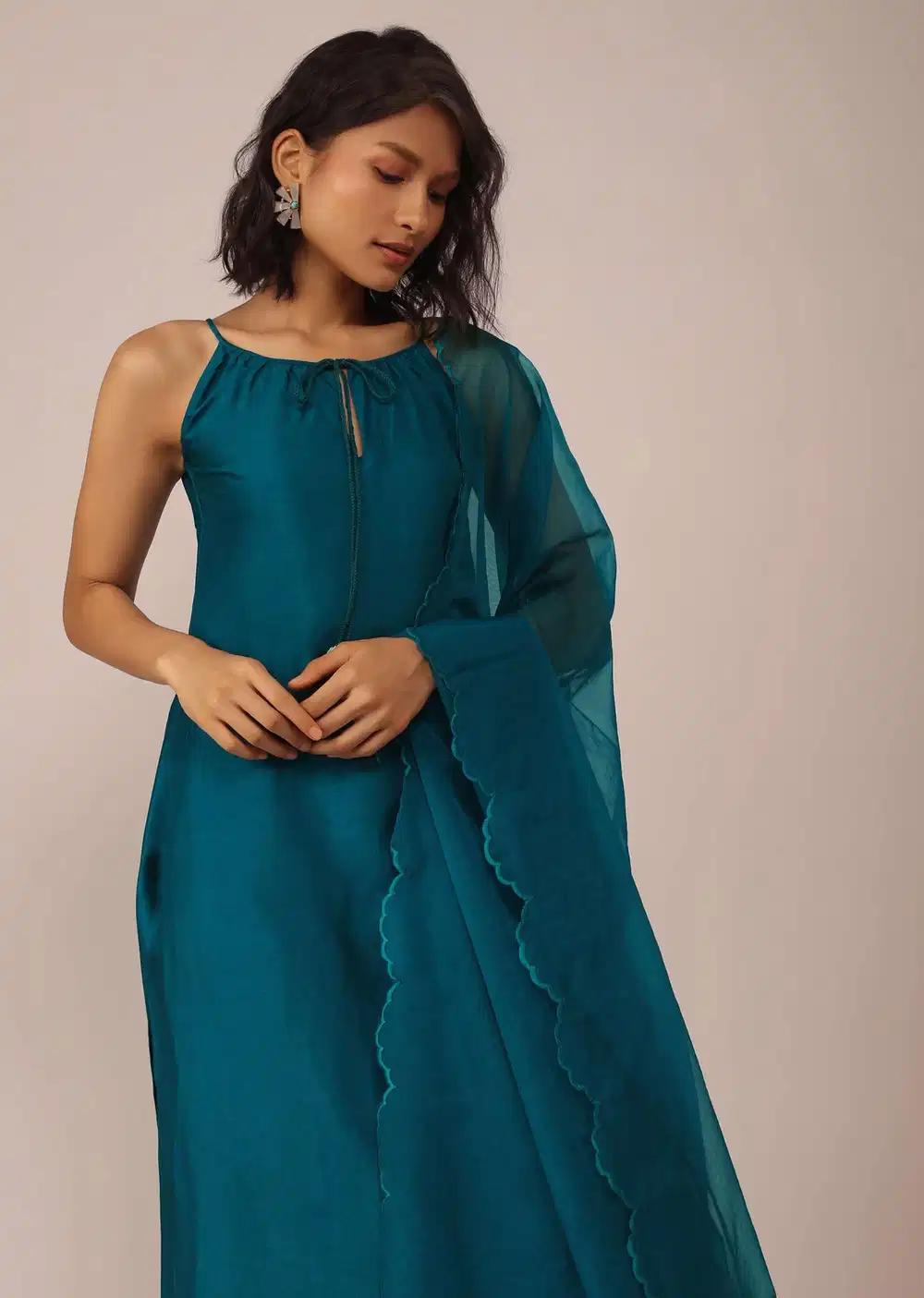 Teal Blue Plain Suit Ensemble In Art Silk With Tassels Adorned Dupatta