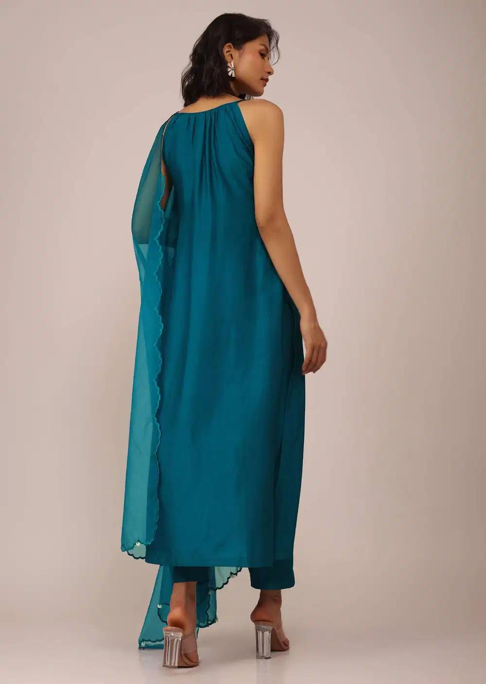 Teal Blue Plain Suit Ensemble In Art Silk With Tassels Adorned Dupatta