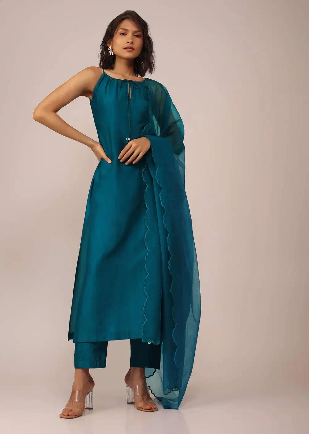 Teal Blue Plain Suit Ensemble In Art Silk With Tassels Adorned Dupatta