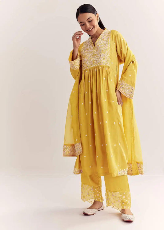 Yellow Silk Kurta Ensemble With Thread Work And Organza Dupatta Outfit