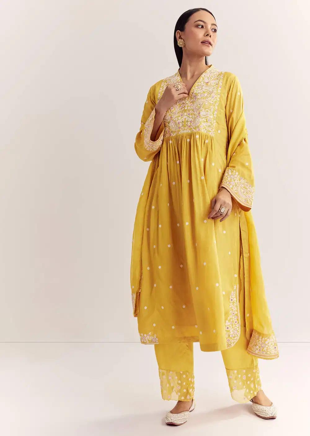 Yellow Silk Kurta Ensemble With Thread Work And Organza Dupatta Outfit