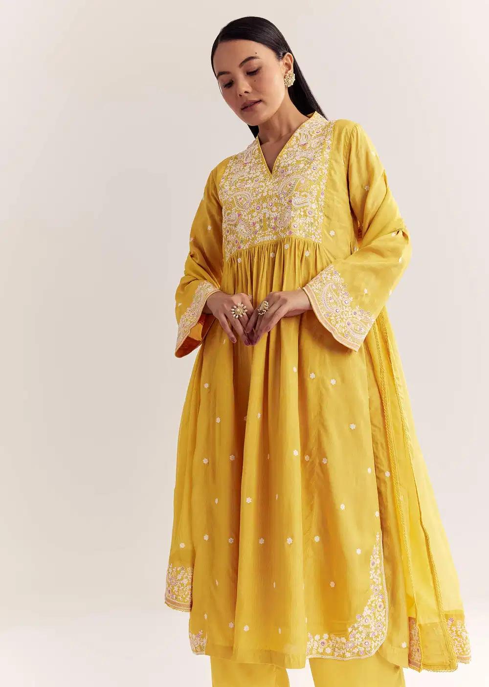 Yellow Silk Kurta Ensemble With Thread Work And Organza Dupatta Outfit
