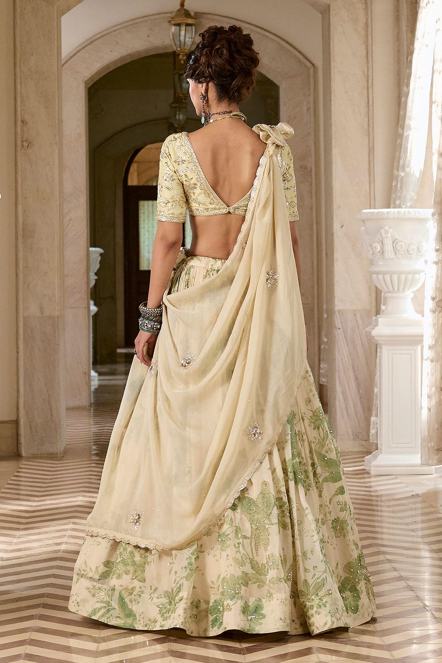 Ivory Organza, Shantoon Embroidery, Tassels V-neck Printed Lehenga Set - Designer Kurta Set