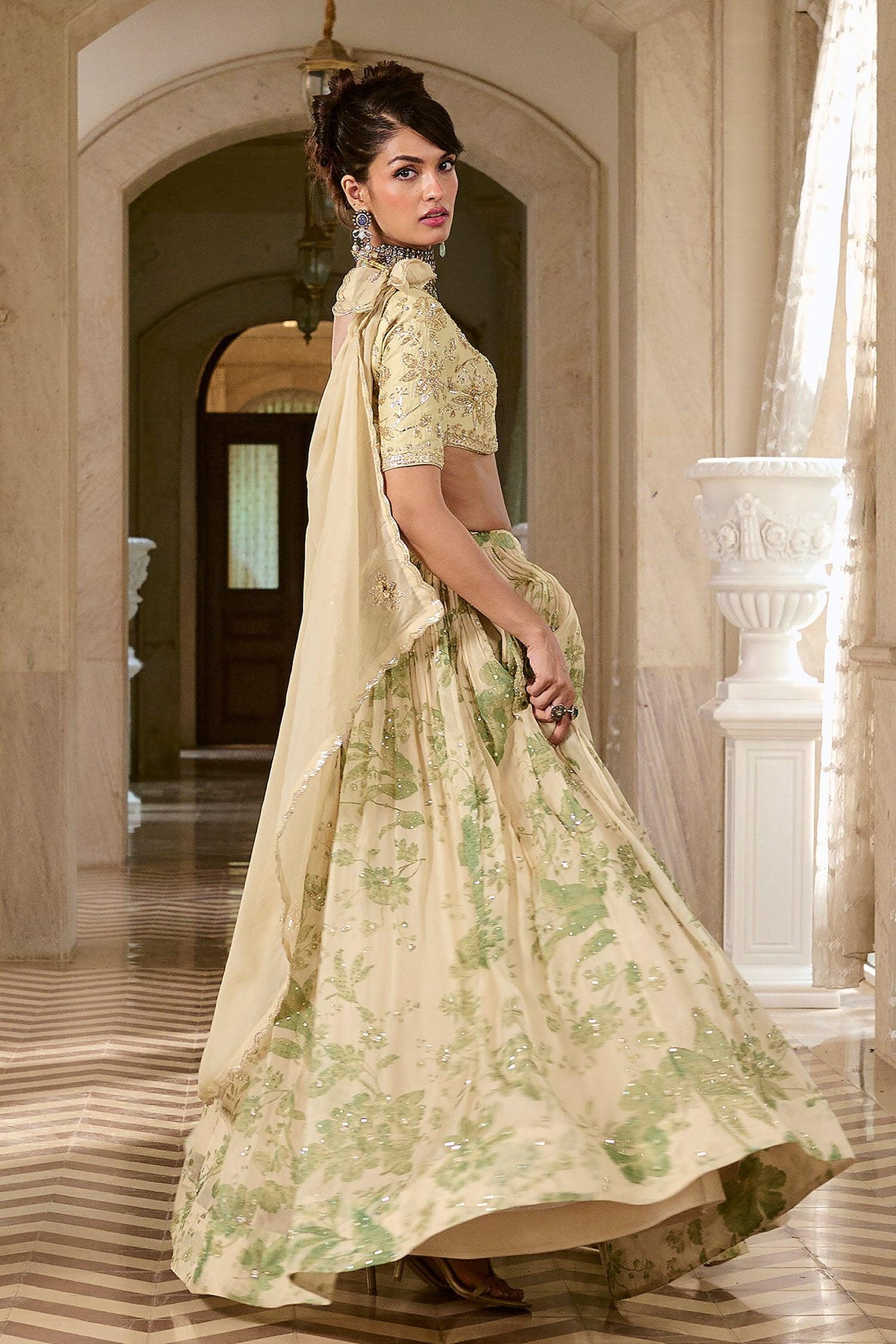 Ivory Organza, Shantoon Embroidery, Tassels V-neck Printed Lehenga Set - Designer Kurta Set
