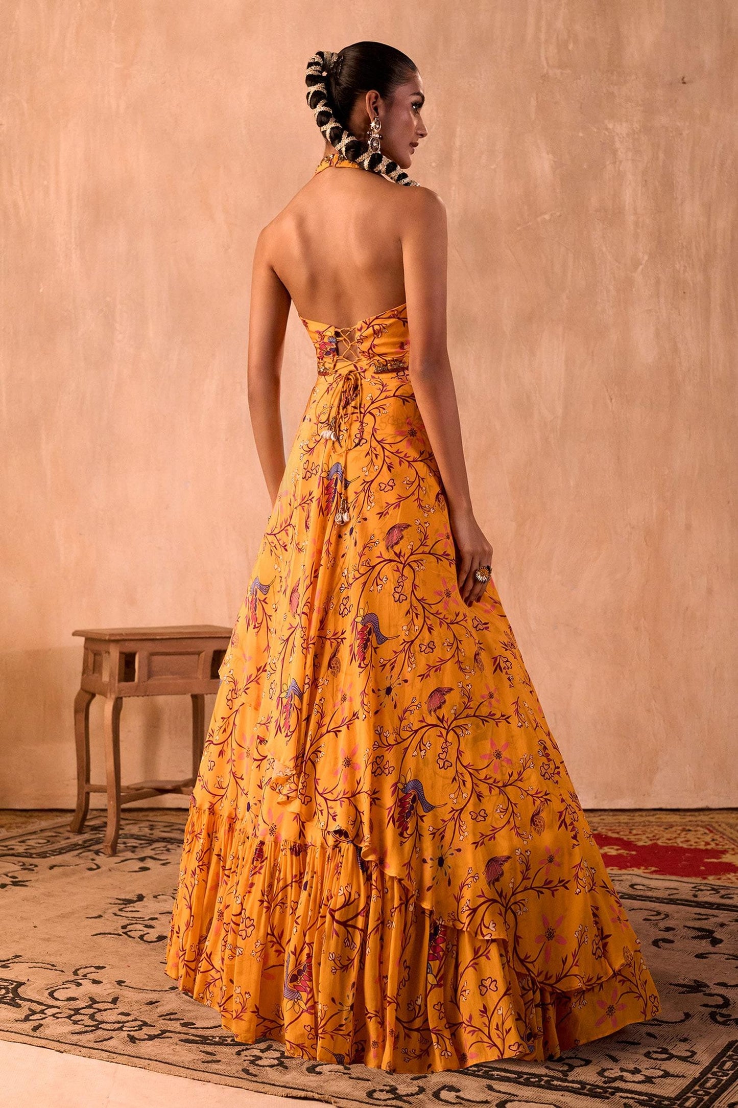 Yellow Crepe Tassels Halter Neck Floral Print Blouse And Layered Lehenga Set - Designer Kurta Set