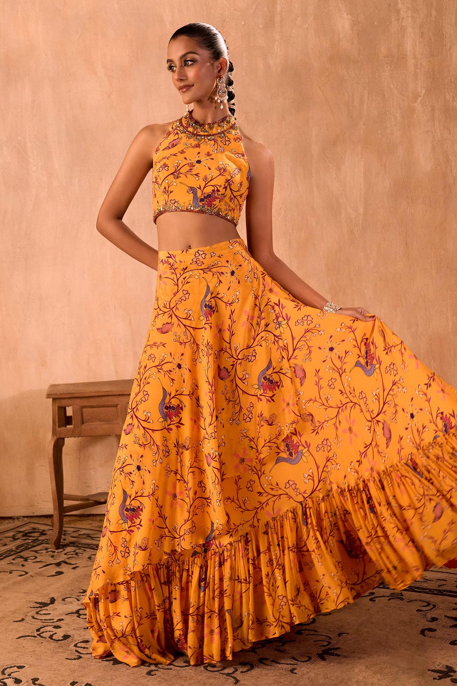 Yellow Crepe Tassels Halter Neck Floral Print Blouse And Layered Lehenga Set - Designer Kurta Set