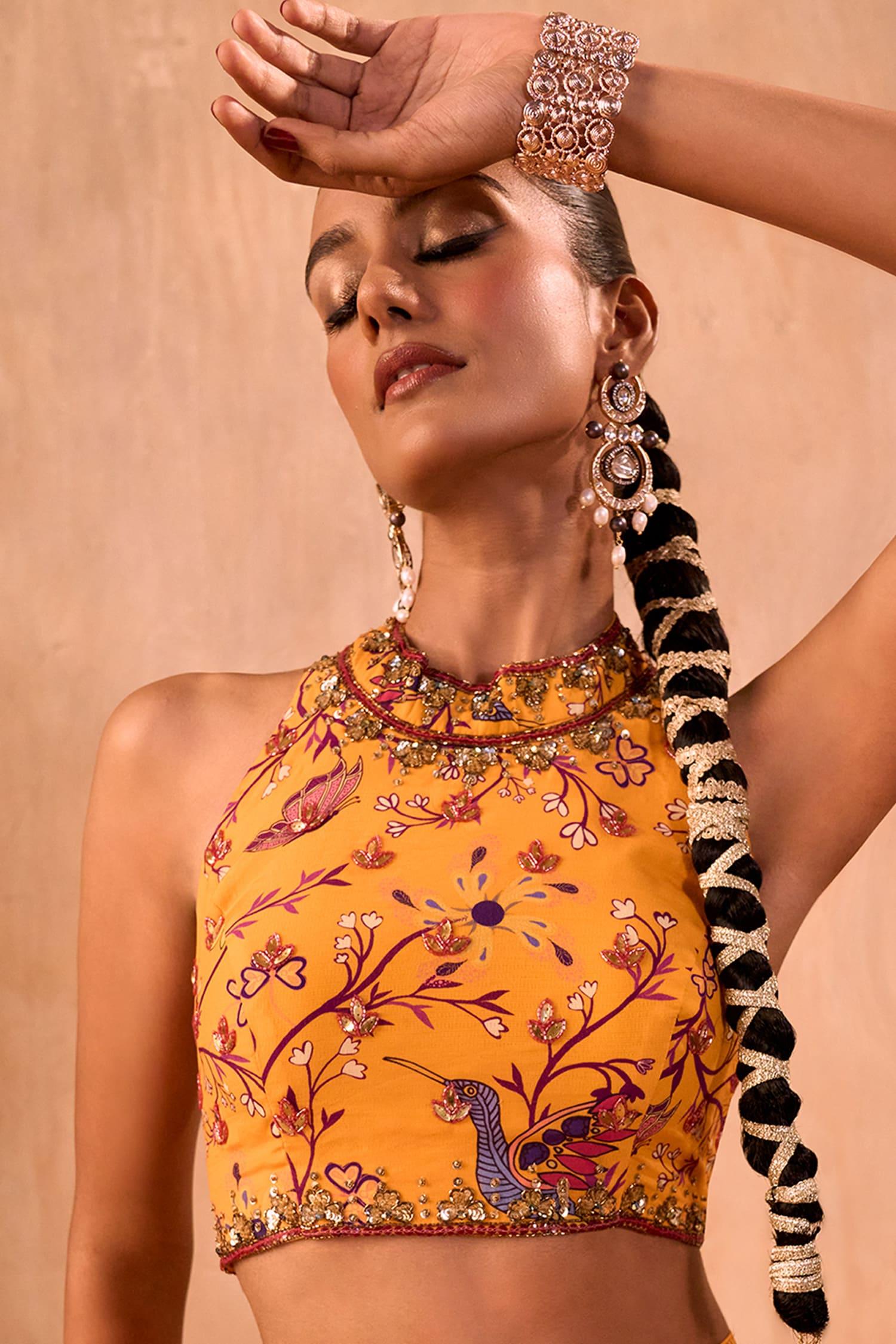 Yellow Crepe Tassels Halter Neck Floral Print Blouse And Layered Lehenga Set - Designer Kurta Set