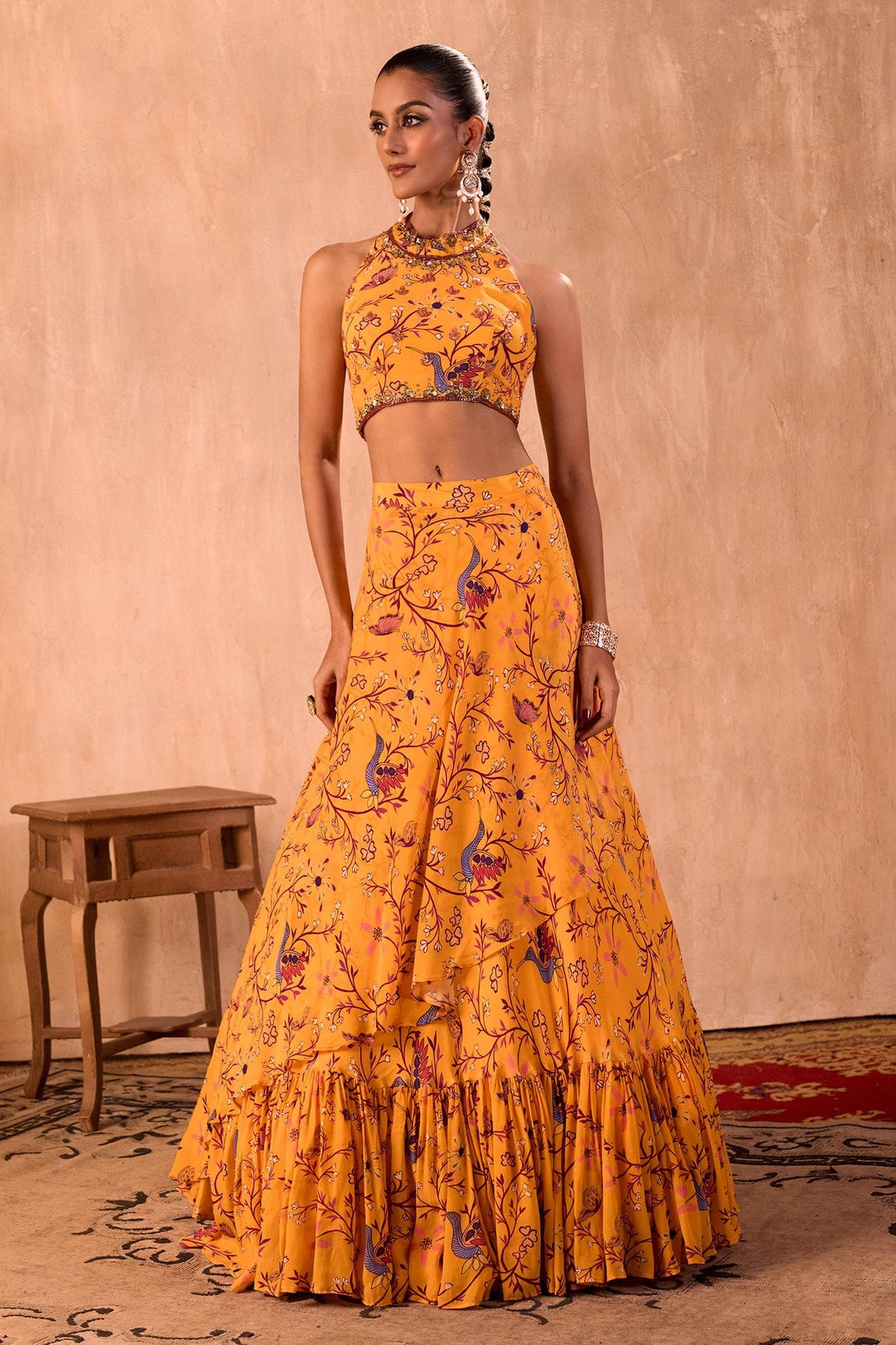 Yellow Crepe Tassels Halter Neck Floral Print Blouse And Layered Lehenga Set - Designer Kurta Set
